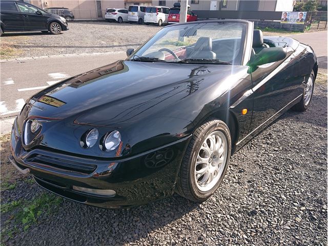 1999 Alfa Romeo Alfa Spider 2.0 - photo 1 1999 Alfa Romeo Alfa Spider 2.0 Coupe for sale, Japanese used car export - photo 1 of 30 | GULJI TRADERS