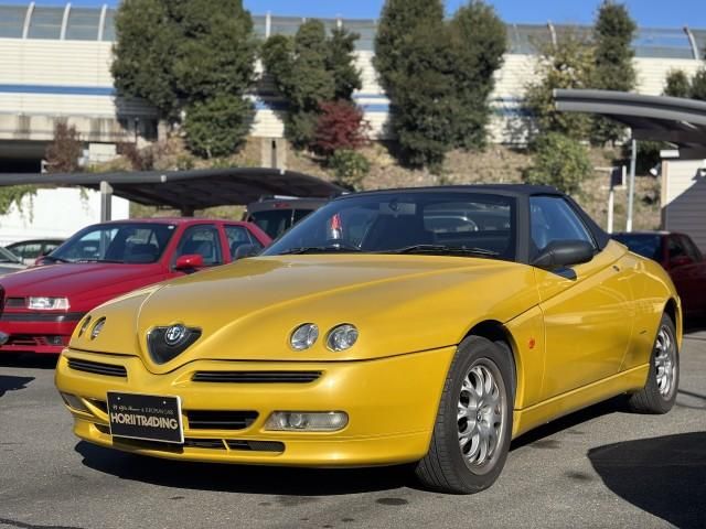 1999 Alfa Romeo Alfa Spider 2.0 - photo 1 1999 Alfa Romeo Alfa Spider 2.0 Coupe for sale, Japanese used car export - photo 1 of 9 | GULJI TRADERS