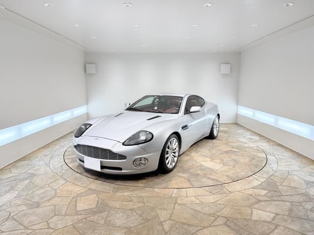 2003 Aston Martin V12 Vanquish Base - photo 1 2003 Aston Martin V12 Vanquish Base Sedan for sale, Japanese used car export | GULJI TRADERS