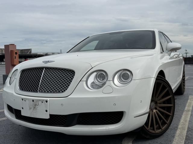 2006 Bentley Continental - photo 1 2006 Bentley Continental White Sedan for sale, Japanese used car export | GULJI TRADERS