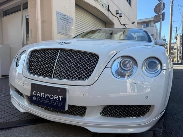 2008 Bentley Continental 6.0 4WD - photo 1 2008 Bentley Continental 6.0 4WD White Sedan for sale, Japanese used car export - photo 1 of 9 | GULJI TRADERS
