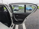 2009 BMW 1 Series 120i White Sedan for sale, Japanese used car export - photo 10 of 50 | GULJI TRADERS