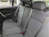 2009 BMW 1 Series 120i White Sedan for sale, Japanese used car export - photo 15 of 50 | GULJI TRADERS