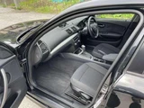 2011 BMW 1 Series 116i Black Sedan for sale, Japanese used car export - photo 18 of 20 | GULJI TRADERS