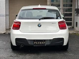 2013 BMW 1 Series 116i M Sport White Sedan for sale, Japanese used car export - photo 8 of 9 | GULJI TRADERS