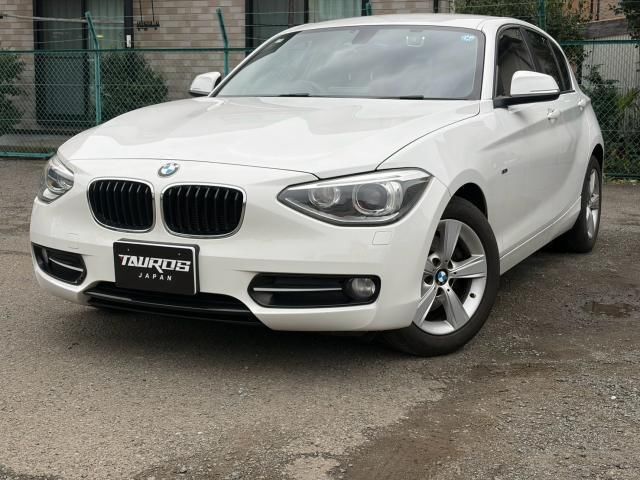 2014 BMW 1 Series 116i Sport White Sedan for sale, Japanese used car export - photo 1 of 9 | GULJI TRADERS