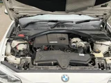 2014 BMW 1 Series 116i Sport White Sedan for sale, Japanese used car export - photo 8 of 9 | GULJI TRADERS