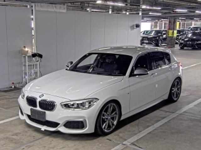 2017 BMW 1 Series M140i - photo 1 2017 BMW 1 Series M140i White Sedan for sale, Japanese used car export - photo 1 of 5 | GULJI TRADERS