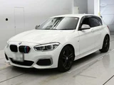 2018 BMW 1 Series M140i White Sedan for sale, Japanese used car export - photo 1 of 12 | GULJI TRADERS