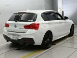 2018 BMW 1 Series M140i White Sedan for sale, Japanese used car export - photo 2 of 12 | GULJI TRADERS