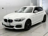 2018 BMW 1 Series M140 i White Sedan for sale, Japanese used car export - photo 1 of 9 | GULJI TRADERS