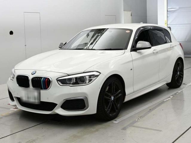 2018 BMW 1 Series M140 i - photo 1 2018 BMW 1 Series M140 i White Sedan for sale, Japanese used car export - photo 1 of 9 | GULJI TRADERS