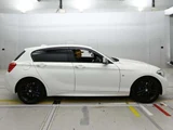 2018 BMW 1 Series M140 i White Sedan for sale, Japanese used car export - photo 7 of 9 | GULJI TRADERS
