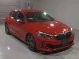 2019 BMW 1 Series M135i xDrive 4WD Red Sedan for sale, Japanese used car export - photo 1 of 8 | GULJI TRADERS
