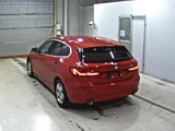 2020 BMW 1 Series 118d Red Sedan for sale, Japanese used car export - photo 2 of 3 | GULJI TRADERS