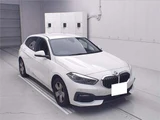 2020 BMW 1 Series 118i White Sedan for sale, Japanese used car export - photo 1 of 11 | GULJI TRADERS