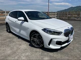 2020 BMW 1 Series 118i M Sport White Sedan for sale, Japanese used car export - photo 1 of 24 | GULJI TRADERS