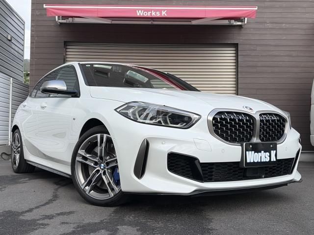 2020 BMW 1 Series M135i xDrive - photo 1 2020 BMW 1 Series M135i xDrive White Sedan for sale, Japanese used car export - photo 1 of 9 | GULJI TRADERS