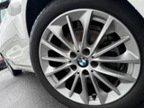 2020 BMW 1 Series 118i Play White Sedan for sale, Japanese used car export - photo 9 of 9 | GULJI TRADERS