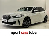 2021 BMW 1 Series 118i M Sport DCT White Sedan for sale, Japanese used car export - photo 1 of 32 | GULJI TRADERS