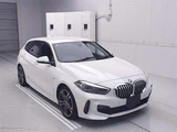 2021 BMW 1 Series 118d M Sport White Sedan for sale, Japanese used car export - photo 1 of 11 | GULJI TRADERS