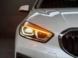 2022 BMW 1 Series 118i Play White Sedan for sale, Japanese used car export - photo 39 of 47 | GULJI TRADERS