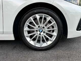 2022 BMW 1 Series 118i Play White Sedan for sale, Japanese used car export - photo 44 of 47 | GULJI TRADERS