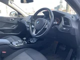2022 BMW 1 Series 118d Play White Sedan for sale, Japanese used car export - photo 11 of 22 | GULJI TRADERS