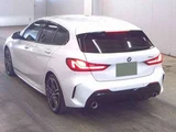 2022 BMW 1 Series 118d M Sport White Sedan for sale, Japanese used car export - photo 4 of 6 | GULJI TRADERS