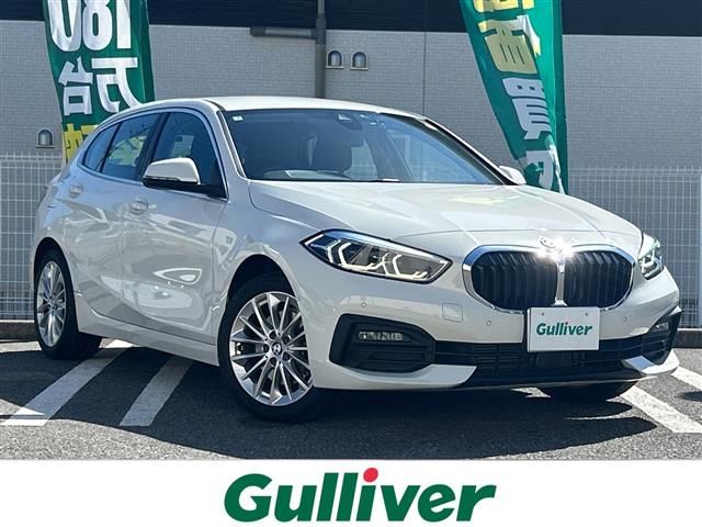 2023 BMW 1 Series 118d Play White Sedan for sale, Japanese used car export - photo 1 of 24 | GULJI TRADERS