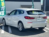 2023 BMW 1 Series 118d Play White Sedan for sale, Japanese used car export - photo 2 of 24 | GULJI TRADERS