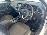 2023 BMW 1 Series 118d Play White Sedan for sale, Japanese used car export - photo 23 of 24 | GULJI TRADERS