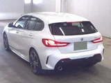 2023 BMW 1 Series 118i M Sport White Sedan for sale, Japanese used car export - photo 2 of 5 | GULJI TRADERS