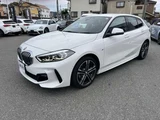 2023 BMW 1 Series 118d M Sport White Sedan for sale, Japanese used car export - photo 1 of 9 | GULJI TRADERS