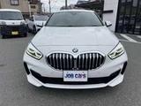 2023 BMW 1 Series 118d M Sport White Sedan for sale, Japanese used car export - photo 5 of 9 | GULJI TRADERS