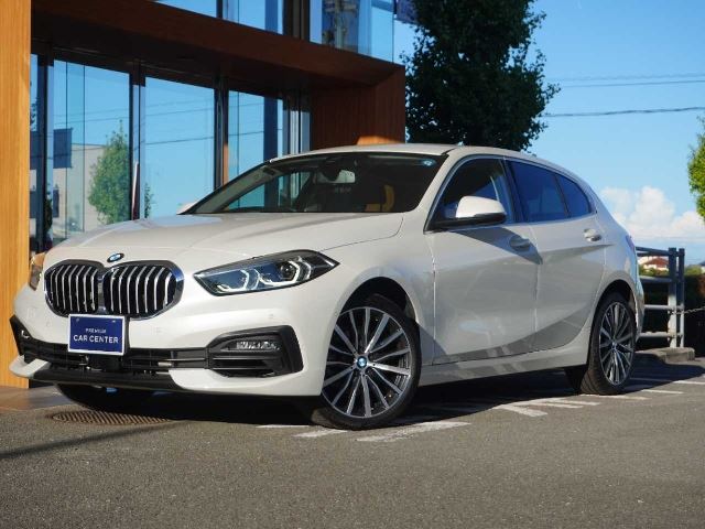 2024 BMW 1 Series 118i Fashionista White Sedan for sale, Japanese used car export - photo 1 of 50 | GULJI TRADERS