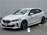 2024 BMW 1 Series 118i M Sport White Sedan for sale, Japanese used car export - photo 1 of 21 | GULJI TRADERS