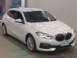 2024 BMW 1 Series 118i Play White Sedan for sale, Japanese used car export - photo 1 of 6 | GULJI TRADERS