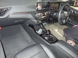 2024 BMW 1 Series 118i Play White Sedan for sale, Japanese used car export - photo 5 of 6 | GULJI TRADERS