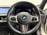 2024 BMW 1 Series 118d M Sport White Sedan for sale, Japanese used car export - photo 7 of 9 | GULJI TRADERS
