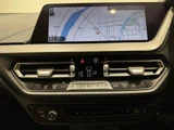 2024 BMW 1 Series 118d M Sport White Sedan for sale, Japanese used car export - photo 8 of 9 | GULJI TRADERS