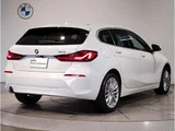 2024 BMW 1 Series 118i Play White Sedan for sale, Japanese used car export - photo 2 of 9 | GULJI TRADERS