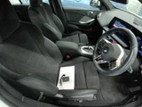 2025 BMW 1 Series 120d M Sport White Sedan for sale, Japanese used car export - photo 10 of 12 | GULJI TRADERS