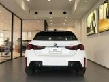 2025 BMW 1 Series 120d M Sport White Sedan for sale, Japanese used car export - photo 5 of 9 | GULJI TRADERS