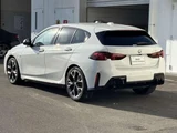 2025 BMW 1 Series 120d M Sport White Sedan for sale, Japanese used car export - photo 2 of 4 | GULJI TRADERS