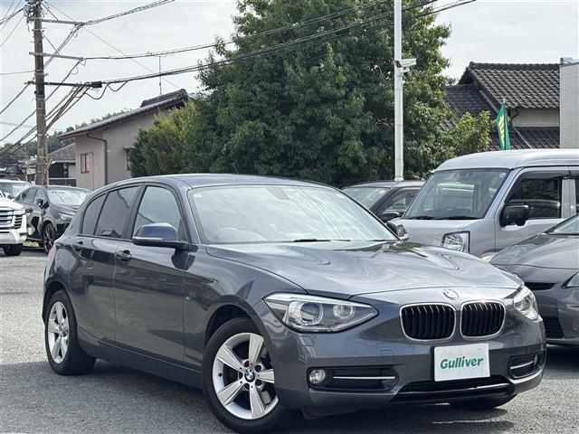 2014 BMW 116i Sport 116i Sport - photo 1 2014 BMW 116i Sport 116i Sport Gray Sedan for sale, Japanese used car export - photo 1 of 24 | GULJI TRADERS