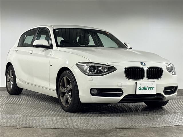 2014 BMW 116i Sport 116i Sport - photo 1 2014 BMW 116i Sport 116i Sport White Sedan for sale, Japanese used car export - photo 1 of 24 | GULJI TRADERS