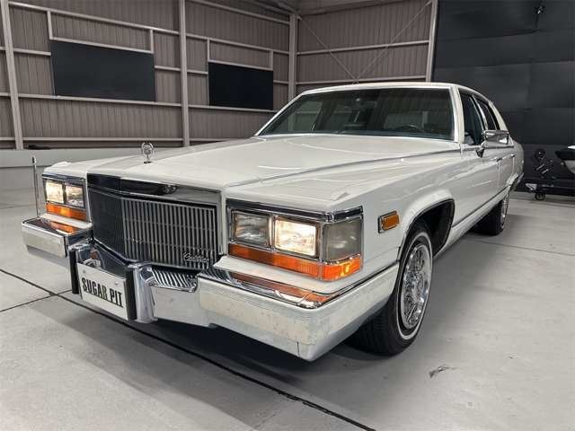 1992 Cadillac Fleetwood - photo 1 1992 Cadillac Fleetwood Sedan for sale, Japanese used car export | GULJI TRADERS