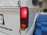1999 Chevrolet Astro Starcraft Coach High Roof 2WD, Authorized Dealer Vehicle, Navigation System White Sedan for sale, Japanese used car export - photo 12 of 47 | GULJI TRADERS