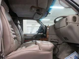 1999 Chevrolet Astro Starcraft Coach High Roof 2WD, Authorized Dealer Vehicle, Navigation System White Sedan for sale, Japanese used car export - photo 21 of 47 | GULJI TRADERS